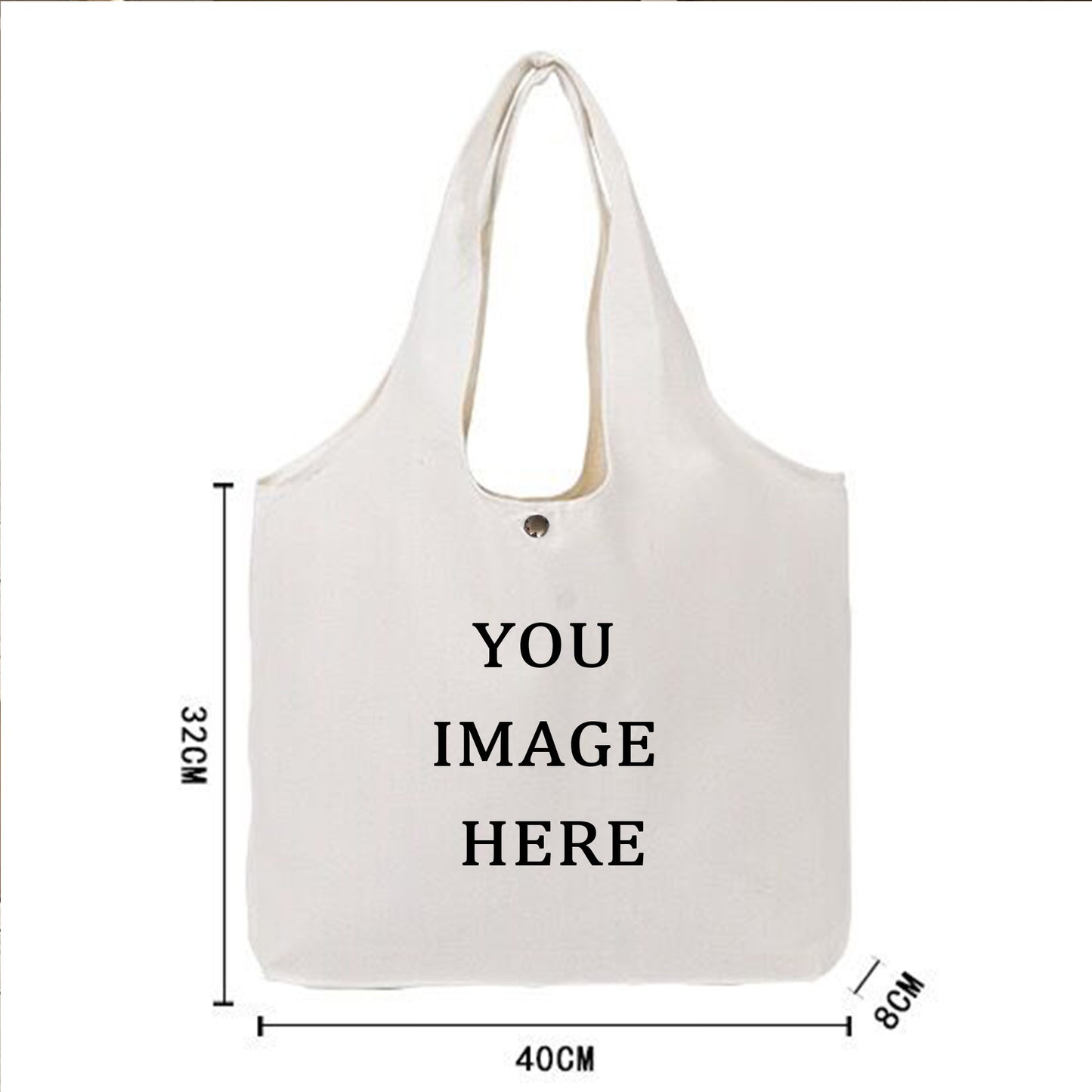 A plain well-made canvas tote bag with the words "your image here" written on it.