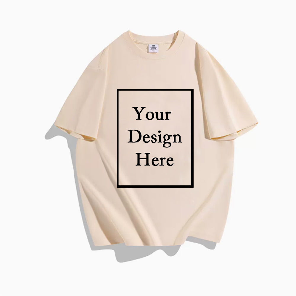 A versatile plain oversized tee in solid apricot color, ready to be personalized with your unique design.