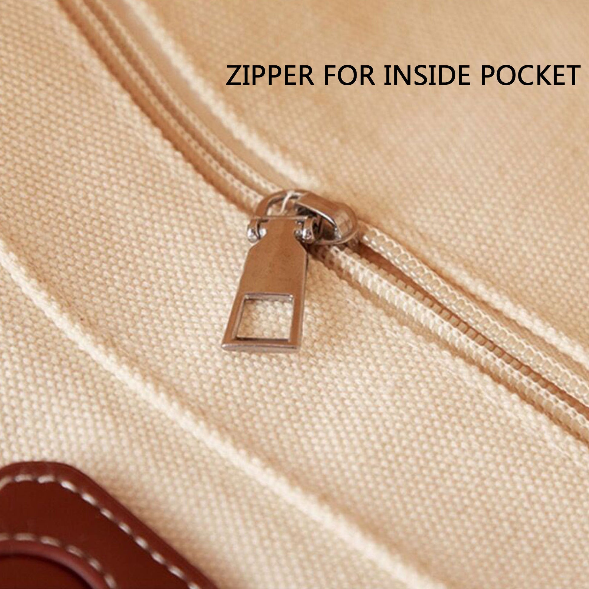 The smooth zipper for inside pocket of a thick personalized tote bag detail.