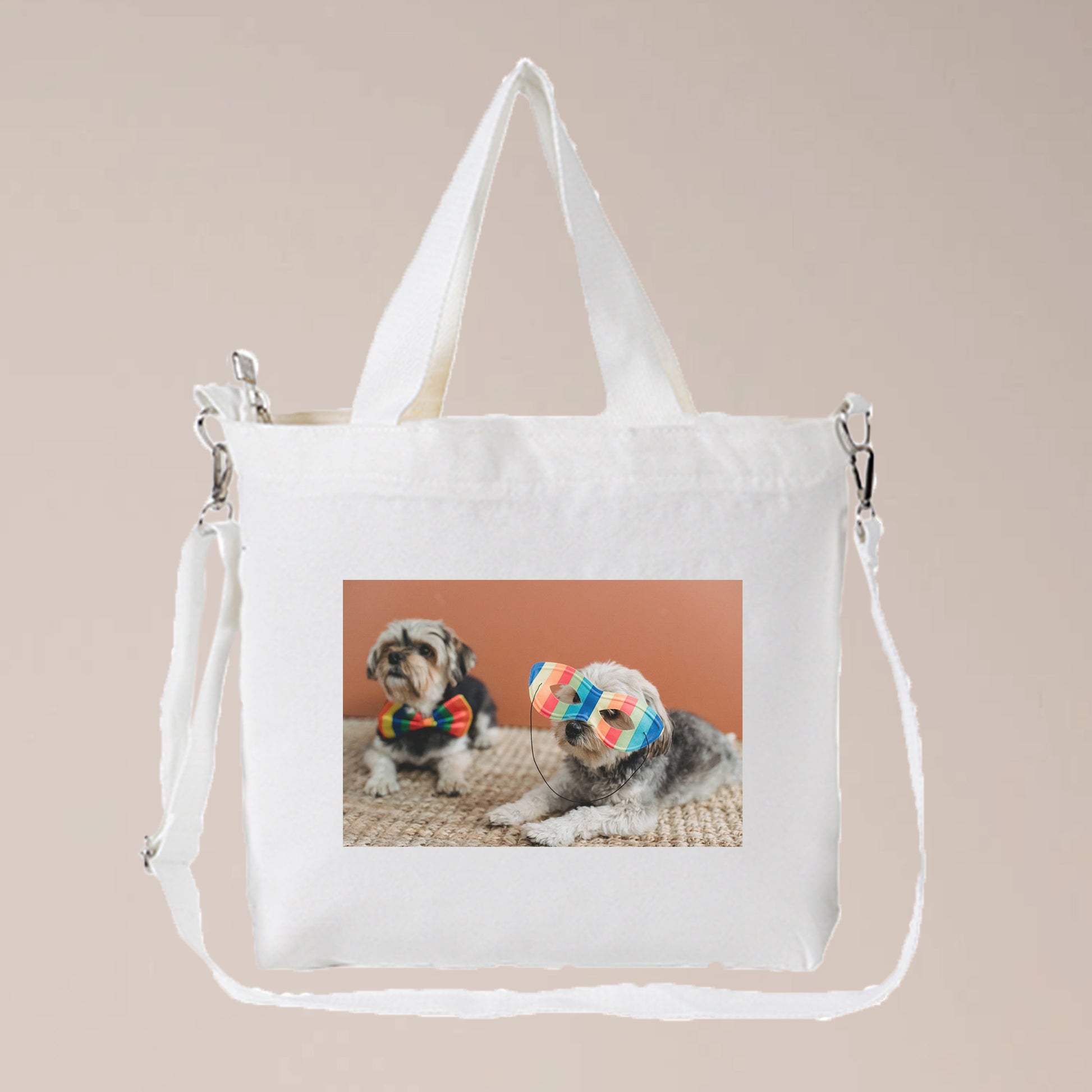 A white custom pet photos bag with a long strap and two short handles, which makes it can be used as a tote bag, or a crossbody. 