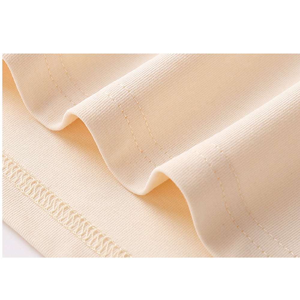 Exquisitely crafted apricot-colored lining on the hem of the t-shirt.
