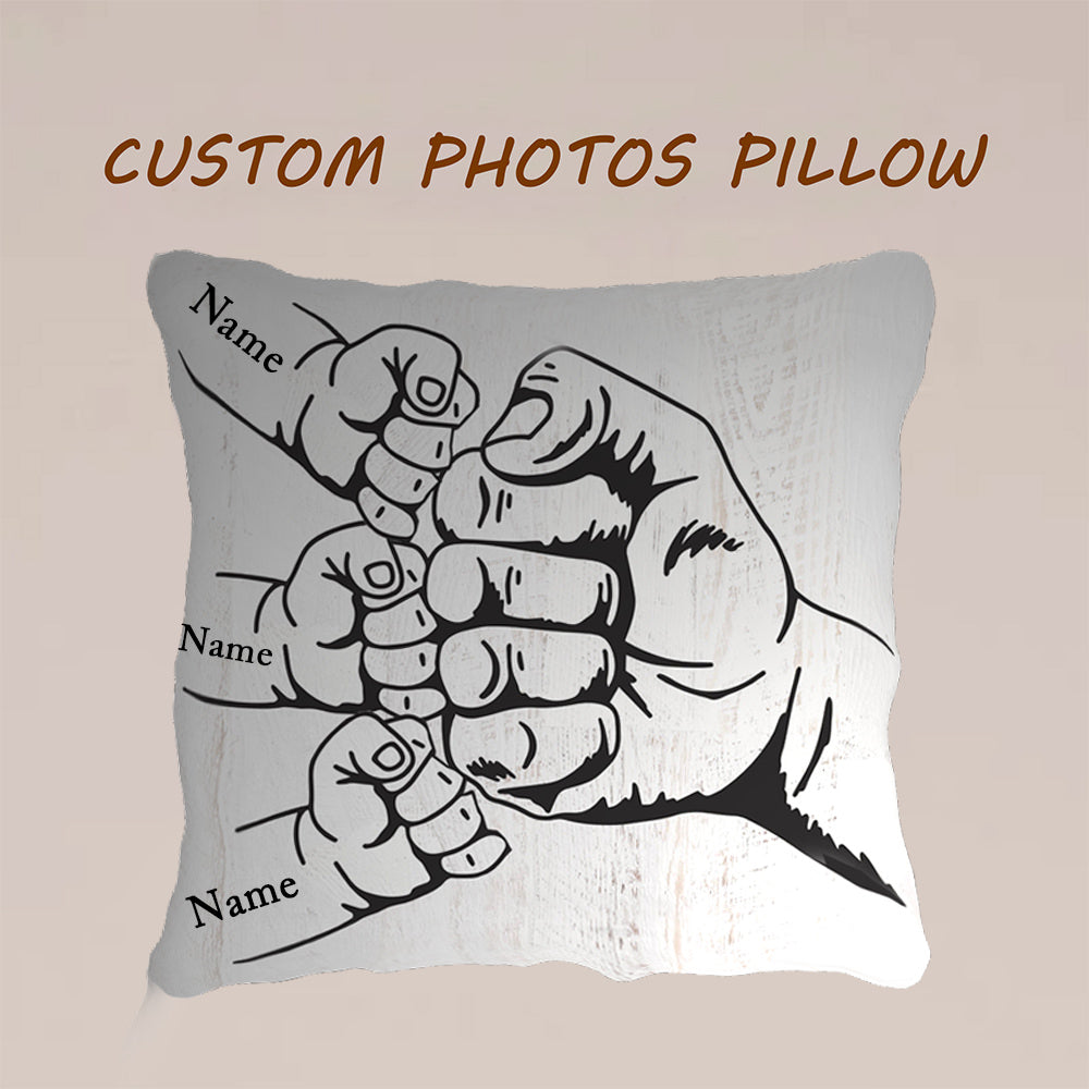 Personalized pillow featuring a fist bump design with names.